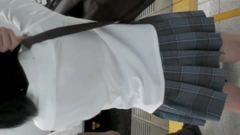 A high school girl drenched in sweat, her polka-dot see-through bra clearly visible